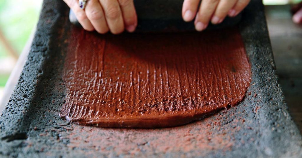 Ground Cacao beans before being mixed into a drink