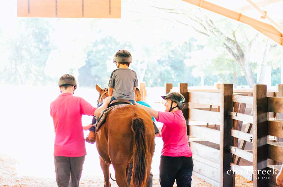 Belize horseback riding at Chaa Creek with REALIZE
