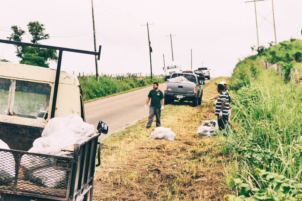 belize sustainable tourism roadside cleanup campaign