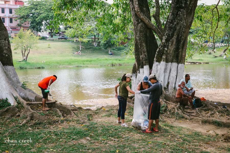 chaa creek belize river cleanup team work