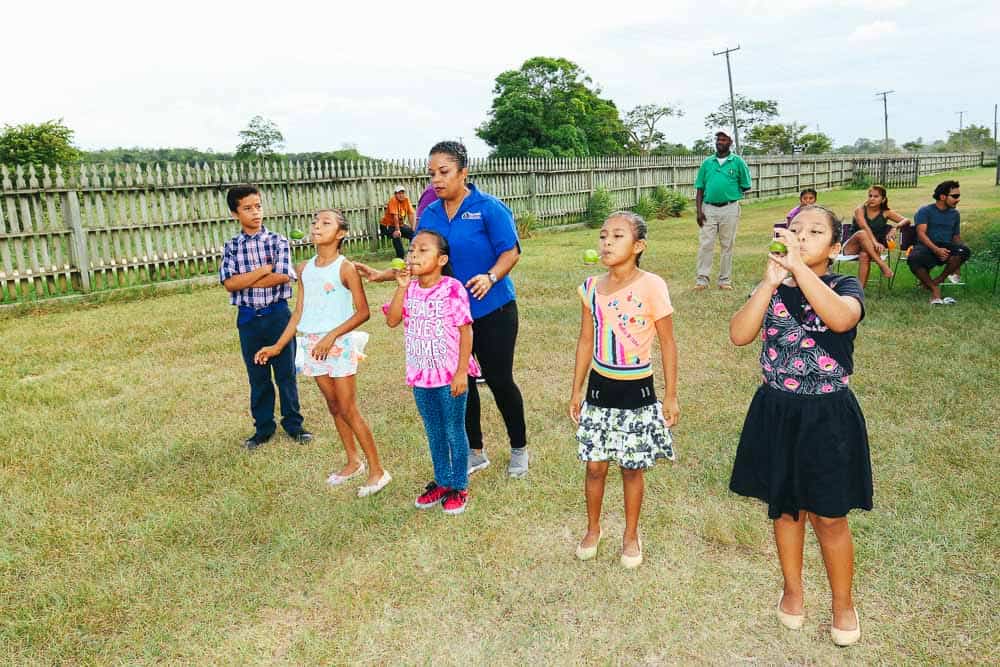 chaa creek corozalito funday kids playing lime and spoon games