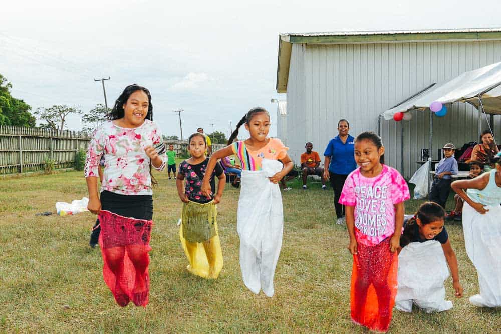 chaa creek corozalito funday kids playing sack race