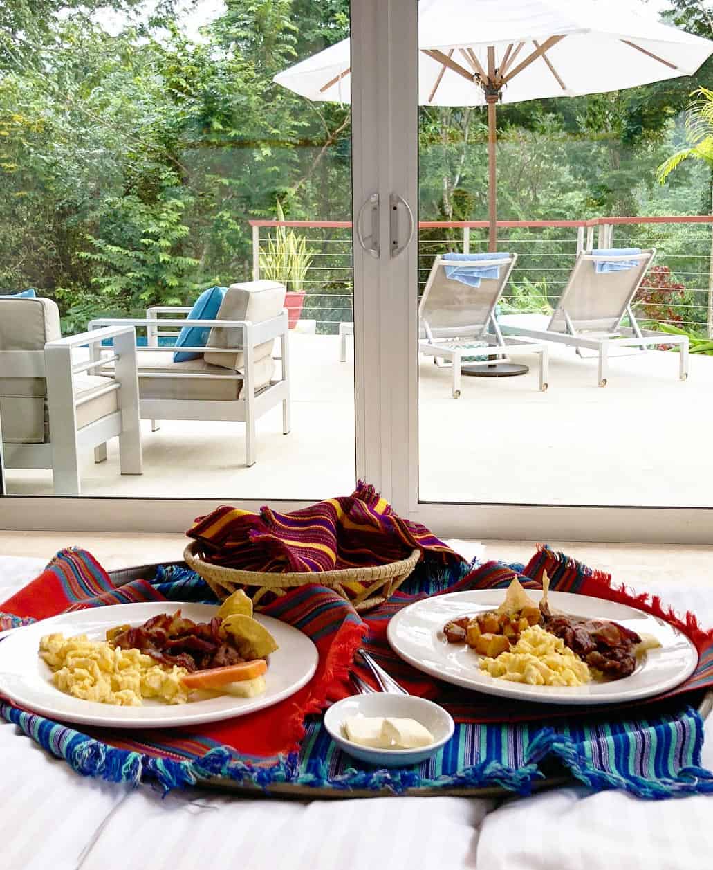 belize romantic getaways breakfast in bed at chaa creek villa
