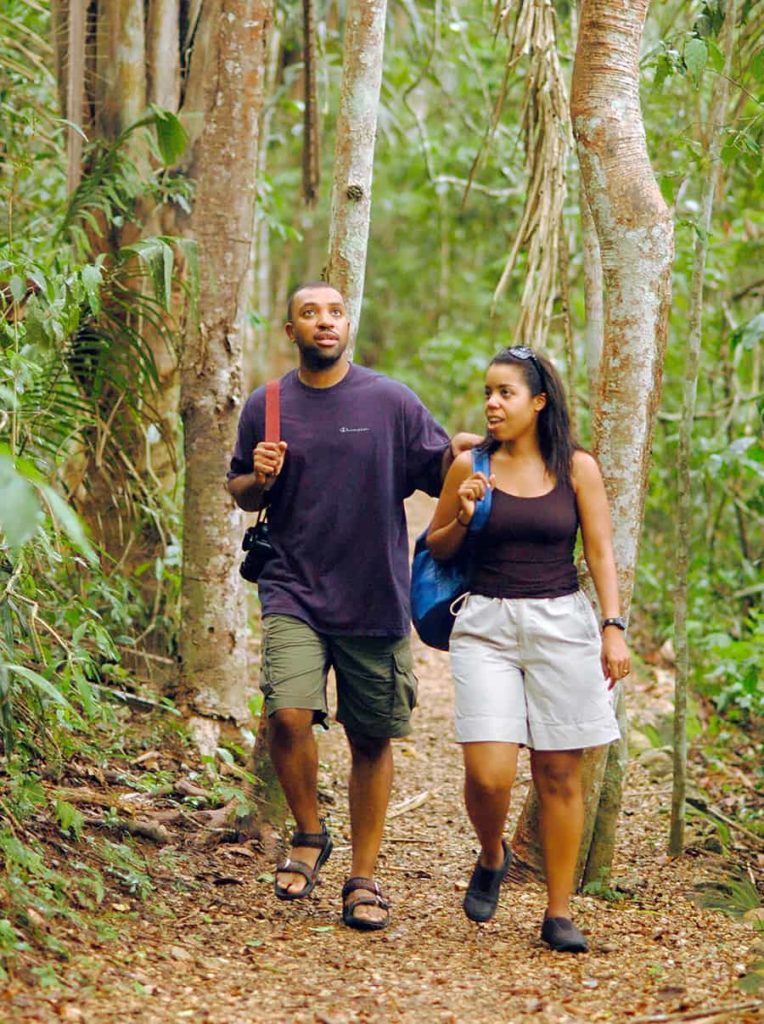 belize nature hiking belizean couple at chaa creek resort