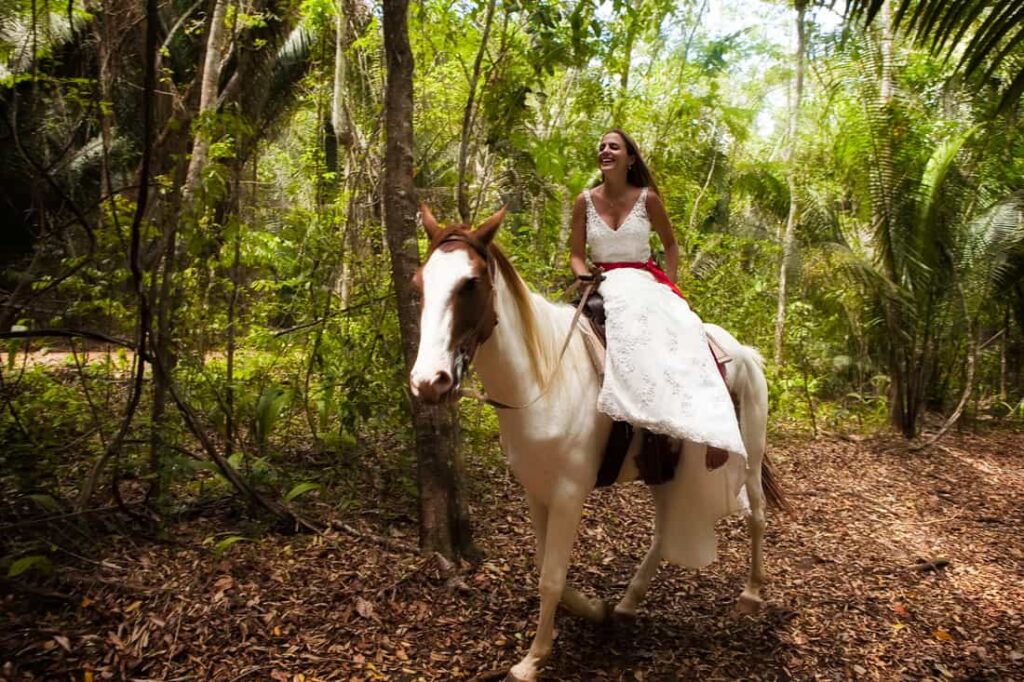 belize destination wedding at chaa creek bridge horseback riding