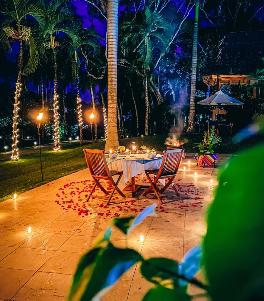 romantic dinner setup poolside at chaa creek