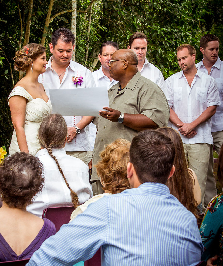 bride and groom with celebrant during belize wedding at chaa creek