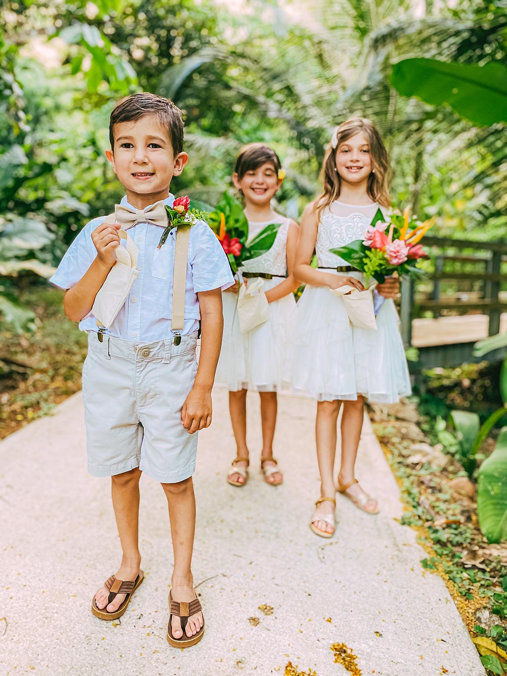 kids with flowers at belize wedding