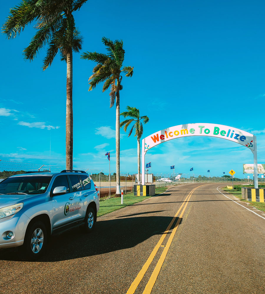 belize airport welcome sign winter web